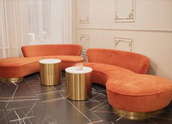 Background image of modern designer furniture in hotel lobby or waiting area, copy space